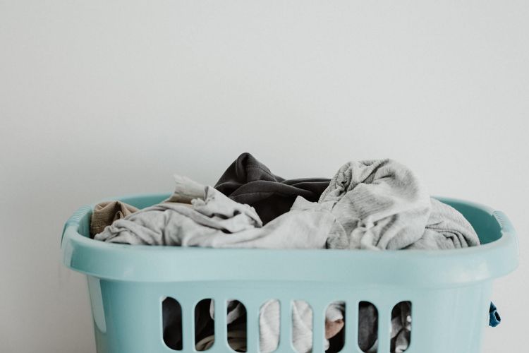 laundry basket with clothes inside